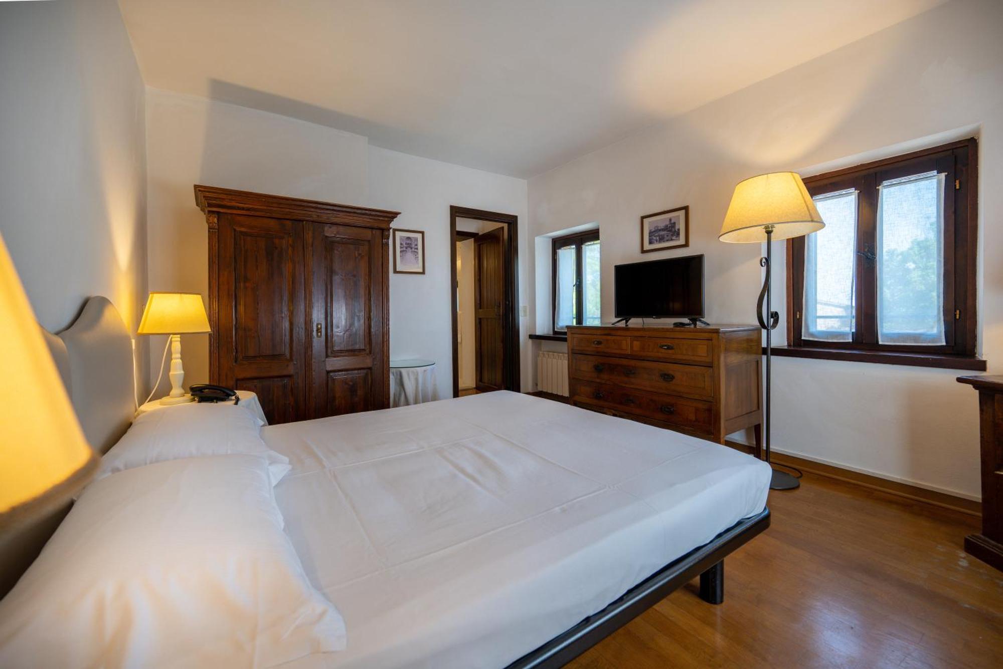 Palazzo Viviani Castello Di Montegridolfo Hotel Ruang foto
